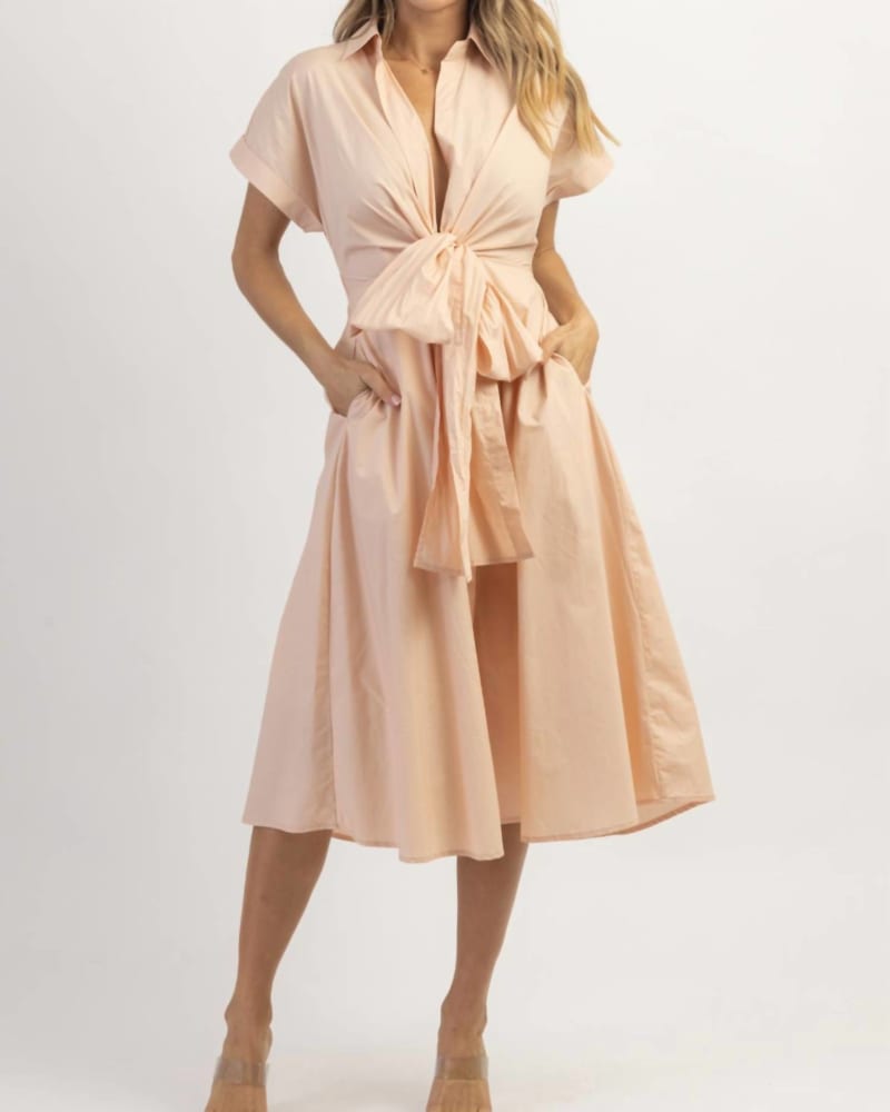 Front of a model wearing a size L Sunny Days Bow Midi Dress In Pink in Pink by MABLE. | dia_product_style_image_id:354846